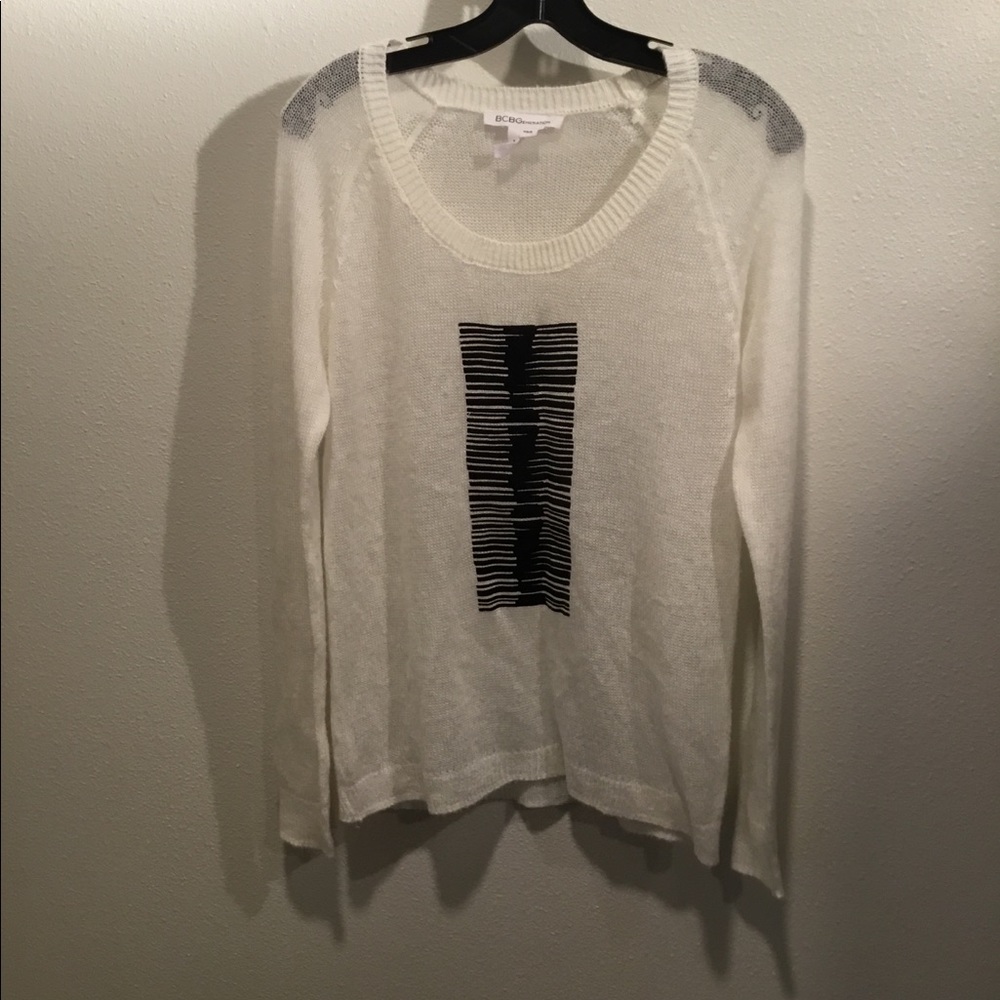 Like new black and white sweater